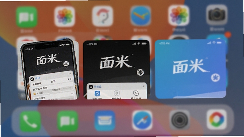 面米应用在手机后台运行时的任务切换预览图,画面显示多任务卡片中面米界面的缩略状态,背景为模糊处理的系统桌面,强调应用在后台运行的稳定性与流畅性表现