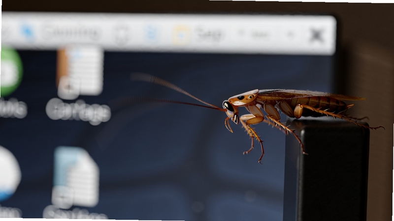 一只cockroach on desktop虚拟蟑螂在电脑屏幕边缘快速爬行,触角微微颤动,背景是深色桌面壁纸,画面主体位于屏幕右侧边缘位置,背景区域为模糊的窗口标题栏和图标,光影效果逼真,突出昆虫的动态细节